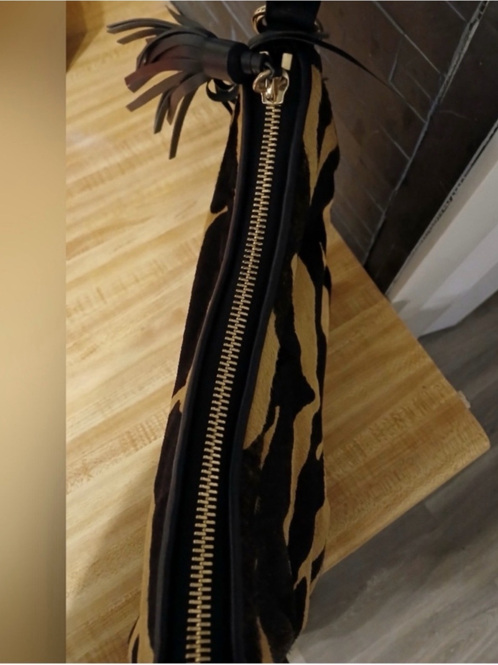 Henri Bendel- Black and Tan Animal-Print Calf Hair Shoulder Bag with Tassel - Picture 5 of 7